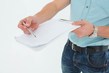 Delivery man with clipboard asking for signature