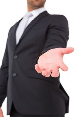 Obraz premium Businessman holding out his hand