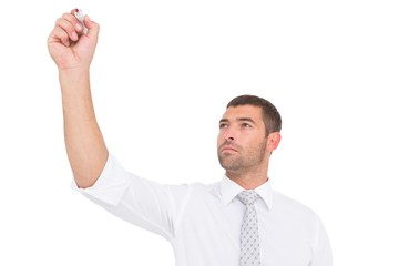 Business man writing with felt