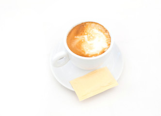 one white cup of Cappuccino coffee with heart shaped milk foam