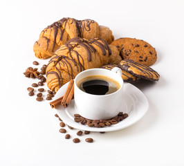 Breakfast with coffee, cookies and croissants on table