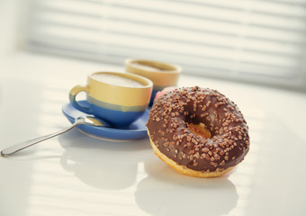 hot coffee and donut in morning. Soft vintage colors
