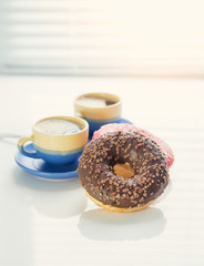 hot coffee and donut in morning. Soft vintage colors