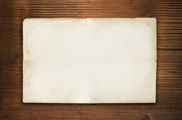 old wood background with empty paper