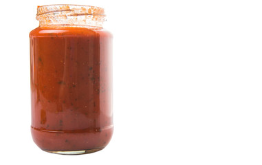 Spaghetti sauce in a jar over white background © akulamatiau