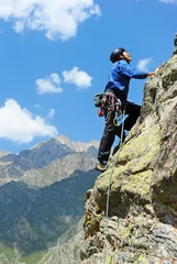 Deurstickers Alpinisme The rock-climber during rock conquest