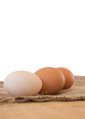 White and Brown  Eggs on Background