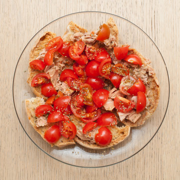 Dried bread called freselle with tuna and tomatoes