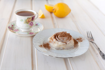 cinnamon roll and tea