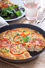 Frittata with vegetables and ham