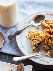 pieces of sweet cake on short pastry with orange jam