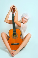 the image of the girl with a guitar