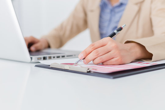 woman hand with business report