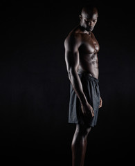 Obraz na płótnie Canvas Bodybuilder with muscular physique