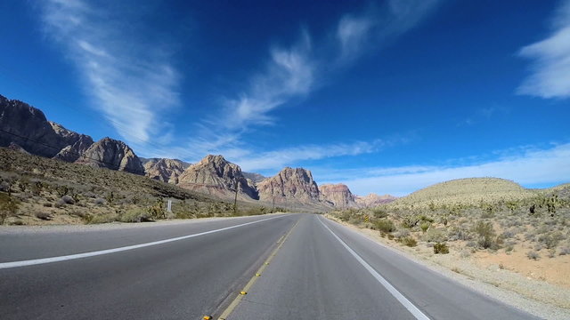 POV Red Rock road drive desert landscape State Route 159 extreme climate Nevada USA
