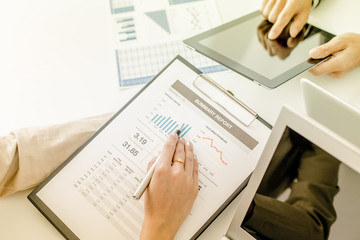 Business people discussing the charts and graphs showing the res