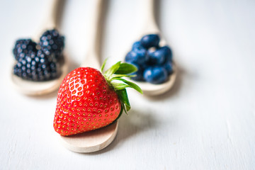 Berries on wooden background
