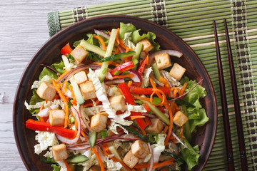 salad of tofu with fresh vegetables horizontal top view