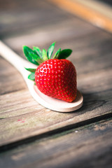 Strawberry on wooden background