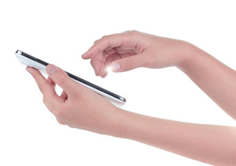 Naklejka premium Hand holding and operating a smart phone isolated on white