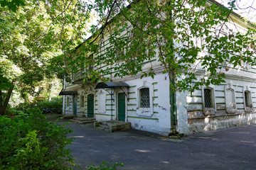 The ancient house with trees