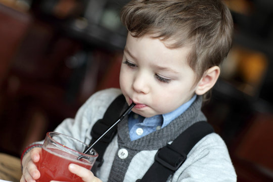 Kid Drinking Red Juice
