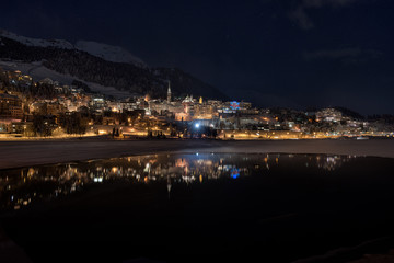 St.moritz mirrored in the lake