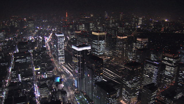 Aerial Metropolis illuminated skyscrapers Tokyo Station Business District Japan 