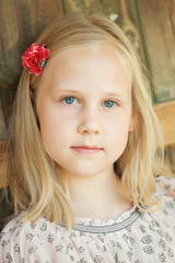 Beautiful young girl relaxing outdoors on a sunny day