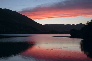 Naklejka na ściany i meble sunset on Lake Scanno