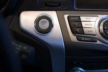 Engine start stop button