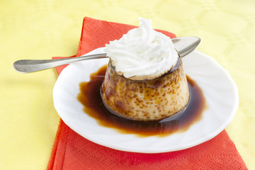 Pudding with cream and syrup
