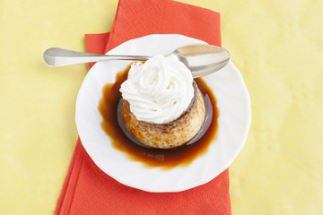 Pudding with cream and syrup