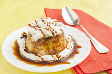 Pudding with cream and syrup