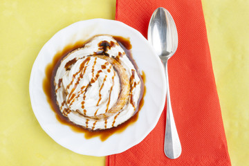 Pudding with cream and syrup