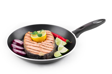 Frying pan with salmon