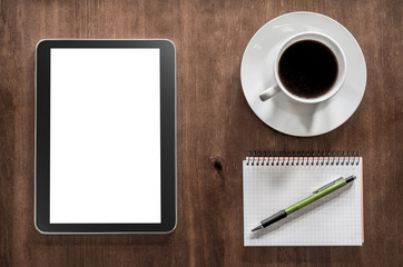 Notepad With Pencil, A Tablet And Coffee On A Living-Room Table