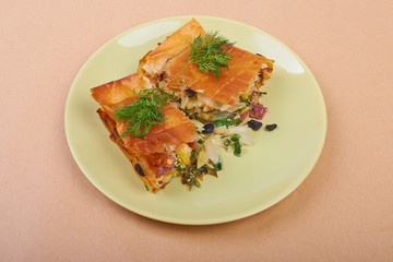 Pie with vegetables and salami