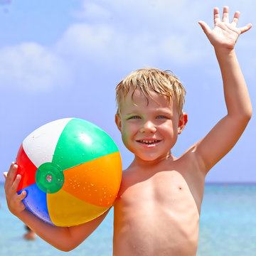 Happy Boy With Beach Ball