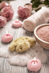 Close-up of candles and flowers