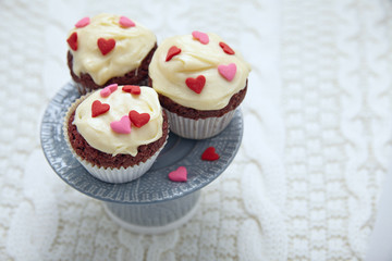 Red velvet cupcakes decorated with hearts
