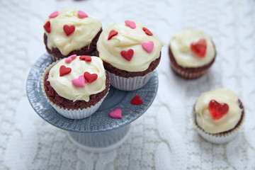 Red velvet cupcakes decorated with hearts