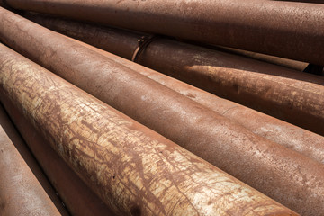 Rusty metal pipes stack