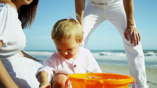 Young Caucasian Parents Baby Son Outdoors Sand Beach