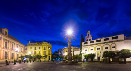 Fototapeta na wymiar Plaza de la Virgen de los Reyes in evening. Seville