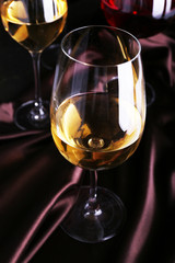 White wine glass on cloth close-up