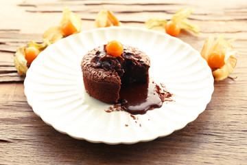 Hot chocolate pudding with fondant centre on plate, close-up
