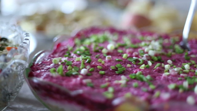 Festive table with side dishes, the camera moves on rails