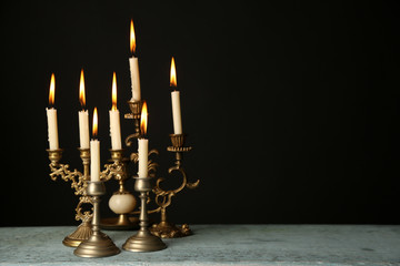 Obraz na płótnie Canvas Retro candlesticks with candles