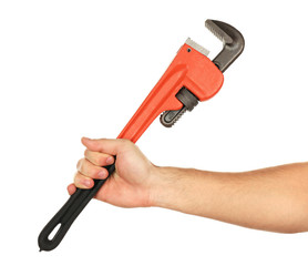Plumbing wrench in male hand isolated on white